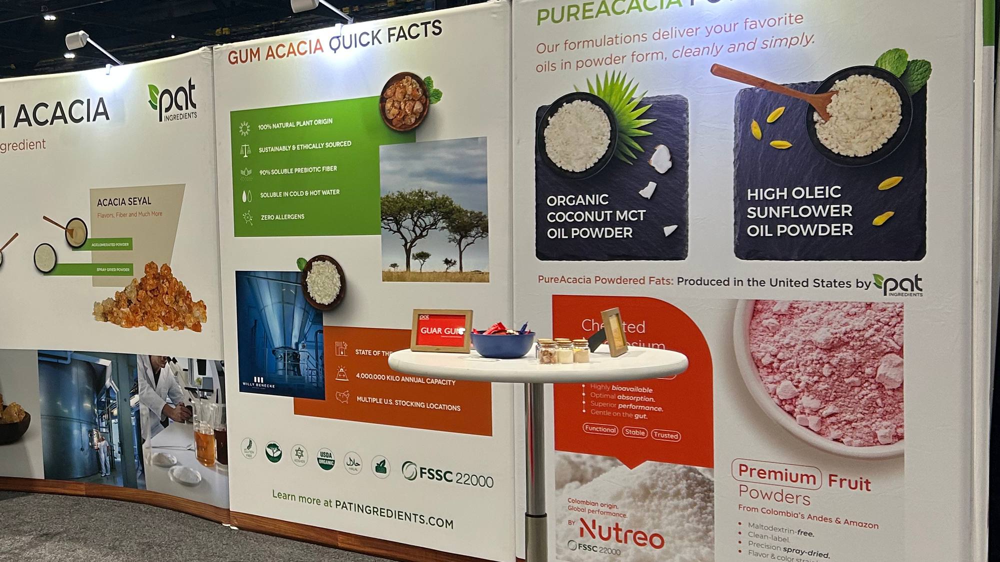 PAT Ingredients booth wall: gum acacia quick facts and PureAcacia powdered fats